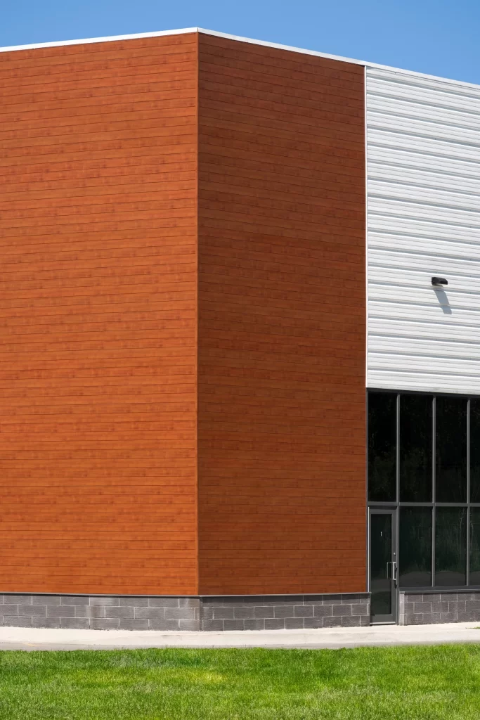 Why Your Building’s “Face” Shouldn’t Fade: AAMA 2604 vs. 2605 Explained